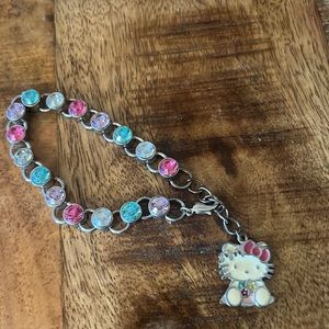 Hello Kitty Rhinestone race it was hello kitty charm .